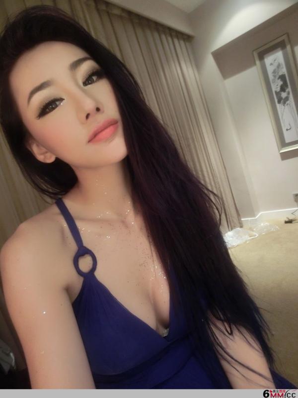 妩媚美女模特金美辛低胸诱人照(11)