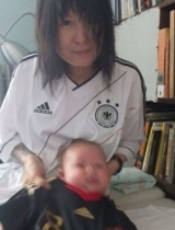 罗琦晒儿子力挺德国队 网友：照片都这么摇滚